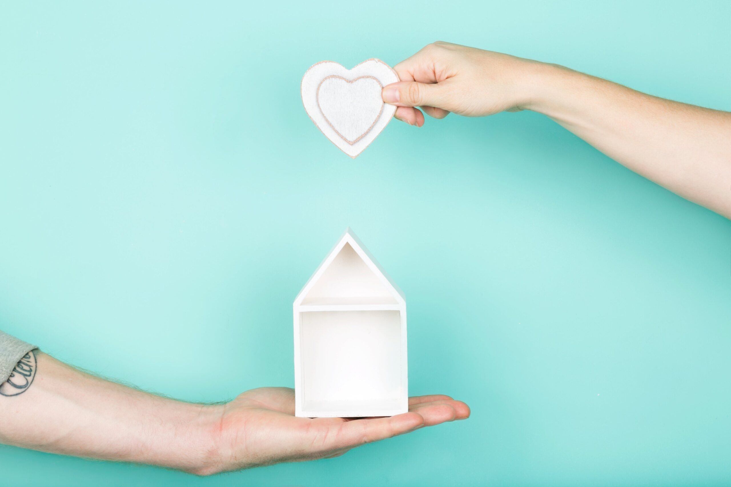 hands heart with house